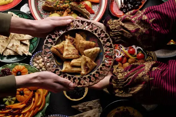 Sizzling Marrakech street food stalls in Jemaa el-Fnaa at night