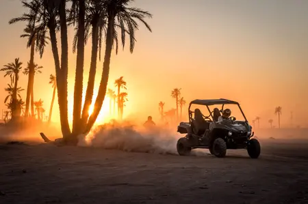 Buggy adventure on rugged tracks near Marrakech with helmet and dust